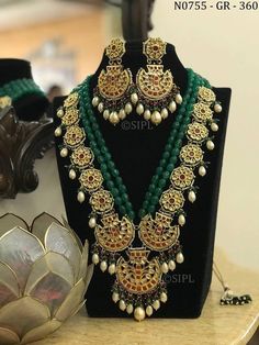 Very beautiful handmade rajwari necklace set combo which add extra glow in you look. Luxury Long Kundan Necklace For Party, Luxury Traditional Green Kundan Necklace, Kundan Necklace With Zari Work For Rituals, Green Chandbali Bridal Necklace For Rituals, Heavy Kundan Chandbalis For Puja, Meenakari Bridal Necklace For Navratri Rituals, Chandbali Kundan Necklace For Puja, Chandbali Gota Work Kundan Necklace For Puja, Kundan Temple Jewelry Necklace For Puja