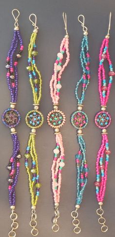 Dreamcatcher glass beaded bracelets please choose from 1-9 * -Handmade - beautiful shine to them Pink Adjustable Beaded Hippie Bracelet, Adjustable Crystal Bracelet With Colorful Beads For Festival, Pink Braided Bracelets With Colorful Beads For Festival, Pink Braided Bracelet With Colorful Beads For Festival, Colorful Beaded Bracelets With Spacer Beads For Festivals, Friendship Bracelets With Spacer Beads For Festival, Colorful Beaded Bohemian Friendship Bracelets, Bohemian Beaded Colorful Friendship Bracelets, Colorful Beaded Festival Bracelets