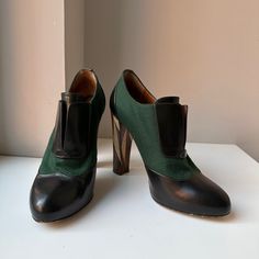 Size 38, But Runs Small 37.5eu/7.5us Some Wear On The Soles, Otherwise In Perfect Condition. Designer Fall Heels For Workwear, Designer Heels For Workwear In Fall, Designer Heels For Fall Workwear, Designer Fall Heels With Leather Sole, Evening Heeled Boots With Rubber Heel Cap, Designer Round Toe Heeled Boots For Work, Wizard Of Oz Fashion, Green Black Color, Fendi Shoes