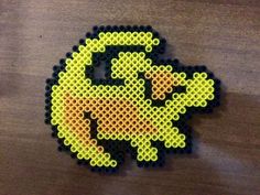 an image of a pixel art piece made out of perler beads on a table