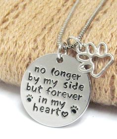 a necklace that says no longer by my side but forever in my heart