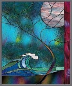 a stained glass window with a wave in the ocean and trees on it's side