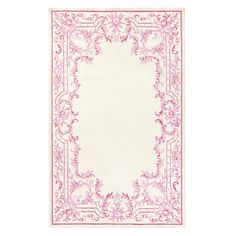 a pink and white rug with an ornate border on the bottom, in front of a white background