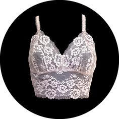 Beige and  cream delicate lace non-wired bralette    Beautiful soft lace  bralette .with Fully shaped cups and adjustable lace straps. Made from a super sheer , beige and cream stretch lace. Available in a variety of cup sizes. Standard sizes are  32/34 a to b 32/34 c to d 32/34 dd-e cup 36/38 b to c 36/38 d to e This listing is for the bralette only... ( briefs are available to purchase separately) please contact me if you need any more details, or are unsure about size you require. this item m Lace Camisole Bra With Lace Trim, Lace Camisole Bra Friendly, Bra Friendly Lace Camisole, Delicate Lace Bra With Lace Trim, Feminine Lace With Built-in Bra, Lace Camisole Bra With Delicate Straps, Lace Spaghetti Straps Bra With Built-in Bra, Delicate Lace Camisole Fitted Bra, Lace Camisole With Built-in Bra