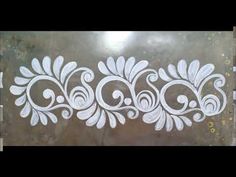 an image of decorative stencils on the side of a door that is being painted