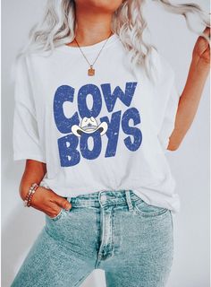 "Show off your love for your favorite team in our Cowboys shirt. This would make a perfect gift for any football lover or cute gift for your girlfriend. Size up for an oversized fit! ITEM DETAIL: - Unisex tee (Comfort Colors) - Available shirt sizes: S - 3XL (sizes run slightly larger than women's shirts and slightly smaller than typical men's shirts) - Please order your normal size for a regular fit or size up for an oversized look! - Please refer to the size chart in the photos for details! MATERIALS:  * 6.1 oz., 100% ring spun cotton * Preshrunk, soft-washed, garment dyed fabric * Twill taped shoulder-to-shoulder * Set-in sleeves * Double-needle stitched sleeves and bottom hem * 1\" ribbed collar with double topstitched neckline CARE INSTRUCTIONS: - Machine wash cold inside out with mil White Graphic T-shirt For Game Day, White Graphic Print T-shirt For Game Day, White Text Print T-shirt For Game Day, White Tops With Letter Print For Fan Merchandise, White Graphic Print Top For Game Day, White Casual T-shirt For Football Season, Casual White T-shirt For Football Season, White Slogan T-shirt For Sports Events, White Tops With Letter Print For Football Season