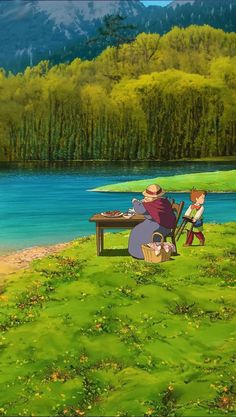 two people sitting at a picnic table on the grass next to a body of water