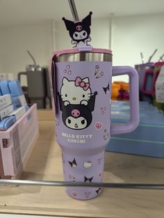 the hello kitty tumbler cup is on display