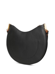 This elegant Coccinelle shoulder bag is crafted from premium black leather with golden metal details, offering a perfect blend of style and functionality. Modern Crossbody Hobo Bag With Gold-tone Hardware, Modern Office Hobo Bag With Gold-tone Hardware, Versatile Formal Hobo Bag With Gold-tone Hardware, Modern Office Shoulder Bag With Brass Hardware, Chic Saddle Bag With Gold-tone Hardware, Chic Saddle Shoulder Bag With Gold-tone Hardware, Black Leather Saddle Bag With Gold-tone Hardware, Formal Crossbody Hobo Bag With Gold-tone Hardware, Chic Saddle Bag With Brass Hardware