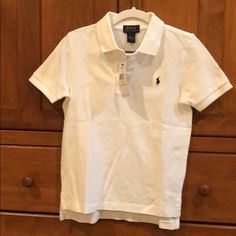 Ralph Lauren Polo Shirt. New With Tags. Classic White Ralph Lauren Shirt, White Cotton Ralph Lauren Top, Fitted Ralph Lauren Collared T-shirt, Classic White Ralph Lauren Polo Shirt, Ralph Lauren Fitted White T-shirt, Ralph Lauren White Summer Top, White Fitted Ralph Lauren T-shirt, Fitted White Ralph Lauren T-shirt, White Ralph Lauren Summer Top