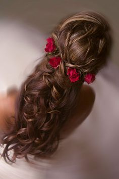 This half-up hairstyle is perfect for a classic fairy tale wedding.