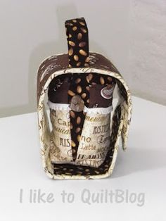 a bag made out of fabric with nuts on the inside and coffee beans in it