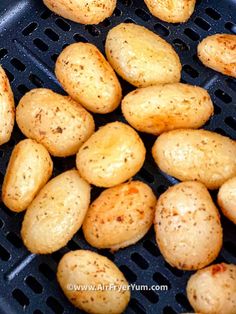 some potatoes are being cooked on a grill