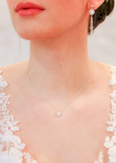 "Elegant bridal necklace with a round crystal pendant on a delicate sterling silver chain. To be worn with matching Joséphine earrings, bracelet and backdrop.   - Length: 41cm (16\") + 4 cm (1.5\") extension chain - Length of pendant: 1cm (0.40\") - Sterling silver chain and clasp If you require a special size, please contact me. We accept returns and exchanges even for special sizes. ♥ Joséphine collection https://www.etsy.com/fr/shop/Princessed1jour?ref=l2-shopheader-name&search_query=josephine ♥ All bridal necklaces https://www.etsy.com/fr/shop/Princessed1jour?section_id=23004653 ♥ My shop https://www.etsy.com/fr/shop/Princessed1jour" Dazzling Halo Design Wedding Jewelry, Dazzling Delicate Chain Necklace For Wedding, Dainty Sparkling Wedding Necklaces, Dazzling Wedding Necklace With Delicate Chain, Delicate Cubic Zirconia Solitaire Necklace For Wedding, Wedding Solitaire Necklace With Sparkling Cubic Zirconia, Halo Round Cut Jewelry For Wedding, Halo Round Cut Wedding Jewelry, Halo Jewelry For Wedding With Round Cut