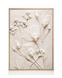 an art piece with white flowers on it