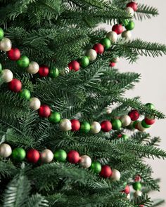 a christmas tree with ornaments hanging from it