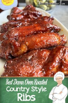 the best damn oven roasted country style ribs recipe is shown on a white plate with green chalkboard