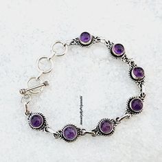 "Amethyst Bracelet, Silver Bracelet, 925 Sterling Silver, Handmade Bracelet, Bracelet For Women, Purple Amethyst Bracelet, Handmade Bracelet. Amethyst Stone Benefits According to online claims, amethysts are said to have several physical healing properties, including: enhancing the immune system. improving endocrine function. improving the skin's appearance. promoting digestive health. reducing headaches. regulating hormones. Known as \"the all purpose stone\", Amethyst is a protective stone tha Bohemian Nickel Free Purple Bracelets, Bohemian Nickel-free Purple Bracelets, Bohemian Nickel-free Purple Bracelet, Bohemian Purple Nickel-free Bracelet, Purple Bohemian Round Bracelet, Elegant Nickel Free Purple Bracelets, Elegant Nickel-free Purple Bracelets, Nickel-free Amethyst Bracelet, Adjustable Silver Amethyst Bracelets