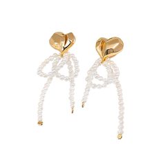 The Freshwater Pearls Tassel Gold Plated Sterling Silver Heart Earrings are elegant and romantic. They feature a heart-shaped design with cascading tassels made of lustrous freshwater pearls. The gold plating adds a touch of luxury, making these earrings perfect for any occasion. These earrings can be worn for various occasions, from formal events to everyday wear. The gold plating enhances the warmth and radiance of the design, while the sterling silver base provides durability and strength. Ke Elegant White Heart Earrings For Formal Occasions, Elegant Dangle Heart Earrings For Party, Elegant Heart Dangle Earrings For Party, Elegant Party Heart Dangle Earrings, Elegant White Heart Earrings, Elegant Heart Earrings For Valentine's Day, Elegant Heart Beads Earrings For Gift, Elegant Heart Beads Earrings As Gift, Elegant Heart Earrings With Heart Beads For Gifts