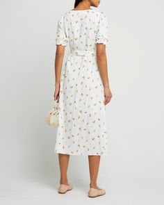 Price Comparison Few Moda $64 Reformation $265 Anthropologie $170 Product Details Light and breezy, this white floral dress is a breath of fresh air. Done with a button up front and adjustable waist tie create an easy fit.- Button up- Adjustable waist tie- Lined- Content: 100% Rayon Style# T22WDR12085 Fit Notes - Model wearing a size XS- Model measurements: 5'9'' Height / 32'' Bust / 25'' Waist / 35'' Hips Bra Size Charts, A Breath Of Fresh Air, White Floral Dress, Breath Of Fresh Air, Price Comparison, Active Wear Tops, Fresh Air, Waist Tie, Bra Sizes