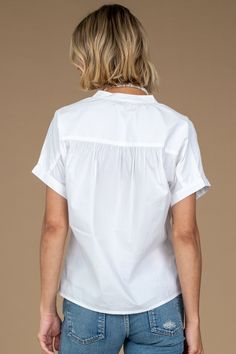 Meet the Tatum Top. The Tatum combines effortless style with relaxed comfort, featuring dolman sleeves, a button-front closure, and a flattering V-neckline. The dolman sleeves provide a chic and relaxed silhouette, while the button-front detail adds a touch of classic sophistication, allowing for easy wear and versatile styling options. The V-neckline adds a feminine flair to the overall look. This top is the perfect piece to elevate a casual-chic look; pair it with your favorite jeans for a lai Modern Tops With Button Closure For Daywear, Modern Everyday Tops With Button Closure, Relaxed Fit V-neck Blouse With Placket, V-neck Tops With Button Closure And Relaxed Fit, Dolman Sleeve, Easy Wear, Favorite Jeans, Effortless Style, Casual Chic