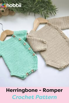 two knitted baby rompers and a teddy bear sitting next to each other on a white surface