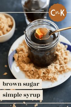 a jar of brown sugar on top of a white plate