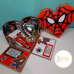 an open spiderman themed box on a table