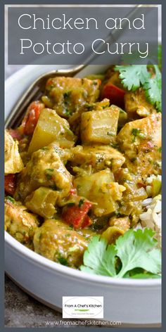 chicken and potato curry in a white bowl with cilantro