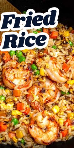 fried rice with shrimp and vegetables in a skillet