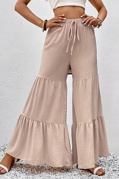 These Tiered Flare Culottes with Drawstring Waist are perfect for a casual look. They feature a tiered design and a tie length. Made from 95% polyester and 5% elastane, they are machine washable and tumble dry low. 

These culottes are perfect for any occasion. They are comfortable and stylish, and the drawstring waist allows for a perfect fit. With a variety of sizes available, you can find the perfect fit for you. Get ready to look your best in these Tiered Flare Culottes with Drawstring Waist Luxury Drawstring Bottoms For Summer, Luxury Women's Drawstring Bottoms, Luxury Elegant Bottoms With Drawstring, Color Dust, American Casual, Tie Length, Look Your Best, Casual Everyday, Flare Pants