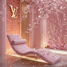 a room decorated with pink flowers and gold letters on the wall, along with a chaise lounge