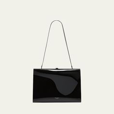 Saint Laurent "Le Anne Marie" shoulder bag in vinyl faux leather (polyurethane) Shoulder strap, 11.8"L Framed top with lift-clasp closure  Golden hardware  Approx. 8.4"H x 11.4"W x 2.7"D Made in Italy Formal Bags With Glossy Finish, Designer Box Bag With Magnetic Closure For Formal Occasions, Designer Box Bag With Magnetic Closure For Formal Events, Elegant Patent Leather Shoulder Bag For Evening, Chic Business Shoulder Bag With Glossy Finish, Luxury Patent Leather Bags For Formal Occasions, Classic Evening Shoulder Bag With Fold Over Clasp, Chic Glossy Finish Shoulder Bag For Business, Modern Evening Satchel Bag