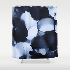 an abstract shower curtain with black and white flowers