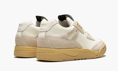 The RHUDE x PUMA Palace Guard is an elevated take on PUMA’s Palace Guard model by the streetwear label.  Released in conjunction with three other PUMA models as well as a range of ready-to-wear wardrobe staples, RHUDE lead designer Rhuigi Villasenor’s reinterpretation on the nominal Palace Guard is awash with subtle details.  A mostly neutral upper is comprised of a Star White leather base and Windchime suede overlays on the heel, midpanel, eyestay and toe.  A black RHUDE x PUMA tab sits on the Puma Casual Shoes, Puma Shoes Mens, Stadium Goods, Colour Star, Pumas Shoes, Mens Casual Shoes, Shoe Collection, White Leather, Wardrobe Staples