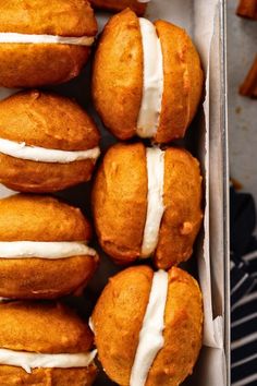 a box filled with donuts covered in frosting