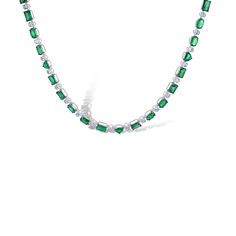 Beautiful 18k white gold necklace with mixed cut emeralds and diamonds. Each different emerald is separated by a diamond in between. This piece has a total emerald carat weight of 17.12 and 4.07 diamond carat weight. The necklace is beautifully crafted to have various stone shapes for a fun elegant look. Fine Jewelry Green Diamond Necklace, Green Diamond Necklace Fine Jewelry, Fine Green Diamond Necklace, Emerald Cut Green Diamond Necklace, Luxury Green Emerald Necklace With Diamond Accents, Emerald Necklace With Diamonds And 17 Jewels, Silver Emerald Jewelry With Baguette Diamonds, Green Emerald-cut Diamond Necklace, Luxury Green Emerald Cut Necklace