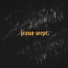 the word jesus weft written in yellow on a black background with grass and trees