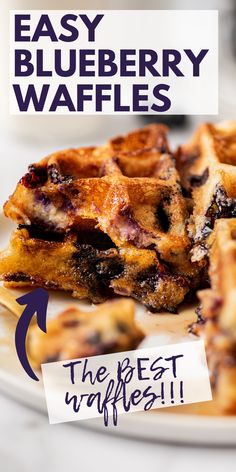 blueberry waffles on a plate with the words easy blueberry waffles