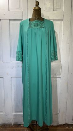 "Vintage dress, green boho caftan, bell sleeves  Green lace around the cuffs of the 3/4 bell sleeves; green lace inset across chest  Adorable and in great condition! Label states, Sears Loungewear, no size listed  Measurements: Chest (lying flat; pit-to-pit): 21.5\" Shoulder-to-shoulder): 17\" Length (from center back to bottom of hem): 52.5\" Sleeve length (from shoulder seam to bottom): 18.5\" Flares out from chest to bottom" Green Flowy Dress With Lace Trim, Flowy Green Dress With Lace Trim, Green Bohemian Dress With Bell Sleeves, Green Bohemian Bell Sleeve Dresses, Boho Caftan, Dress With Bell Sleeves, Boho Green, Caftan Dress, Black Corset