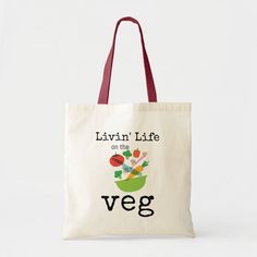 Livin Life on The Veg Vegan Vegetarian Humor Tote Bag Color: Natural and Red. Gender: unisex. Age Group: adult. Organic White Bags For Everyday Use, Organic Tote Bag For Gifts, Organic White Rectangular Bags, White Organic Rectangular Bags, Organic Rectangular Canvas Bag For Everyday Use, White Rectangular Organic Bag, Everyday Organic Tote Bag, Everyday Organic Rectangular Bag, Organic Everyday Tote Bag