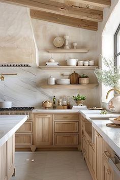 a kitchen filled with wooden cabinets and white counter tops