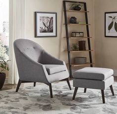 a blue chair and ottoman in a living room