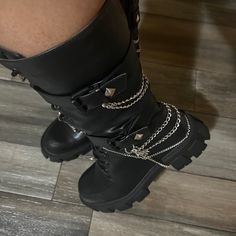 These faux leather black boots are a size 37. They have been customized with chains and spider charms on each boot. Never worn other than for modeling. One of a kind. Black Boots With Chains, Edgy Leather Boots With Chain Detail, Edgy Leather Boots With Chain, Chain Detail Boots With Round Toe For Streetwear, Chain Detailed Round Toe Boots For Streetwear, Chain Detail Round Toe Boots For Streetwear, Punk Style Chain Boots For Streetwear, Trendy Chain Boots For Fall, Chain-decorated Round Toe Boots For Streetwear