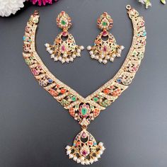 nauratan necklace set inspired by tanishq indian designs Festive Multicolor 22k Gold Bridal Necklace, Elegant Multicolor Kundan Necklace In 22k Gold, Elegant Multicolor 22k Gold Necklaces, 22k Gold Meenakari Jewelry Sets For Celebration, Meenakari 22k Gold Jewelry Sets For Celebration, Bollywood Style Multicolor 22k Gold Jewelry, Bollywood Style 22k Gold Multicolor Jewelry, Multicolor 22k Gold Bollywood Jewelry, Multicolor 22k Gold Necklaces For Celebration