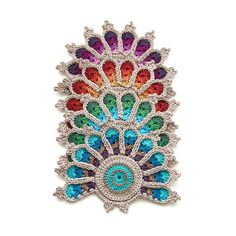 a multicolored crocheted brooch with an intricate design