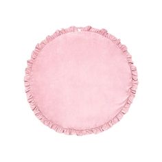 a pink round pillow with ruffled edges