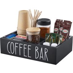 the coffee bar tray is filled with various items