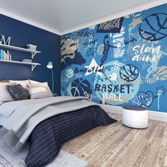 a bedroom decorated in blue and white with basketball themed wallpaper on the walls, along with bookshelves