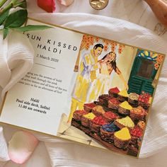 the sun kissed haldii recipe is displayed on a table with flowers and other items